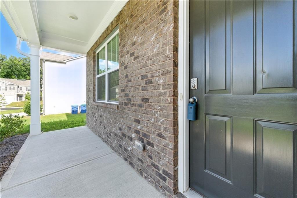 6753 Chilkat Court Southwest Atlanta, GA 30331 - Photo 2 of 16 a view of a door front of a house