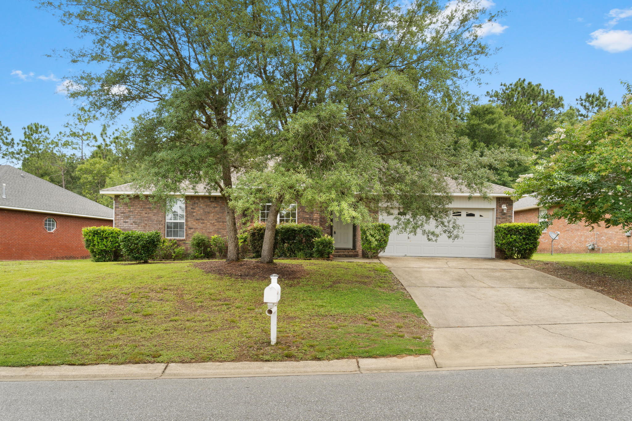 641 Territory Lane Crestview, FL 32536 - Photo 2 of 41 a front view of a house with a yard