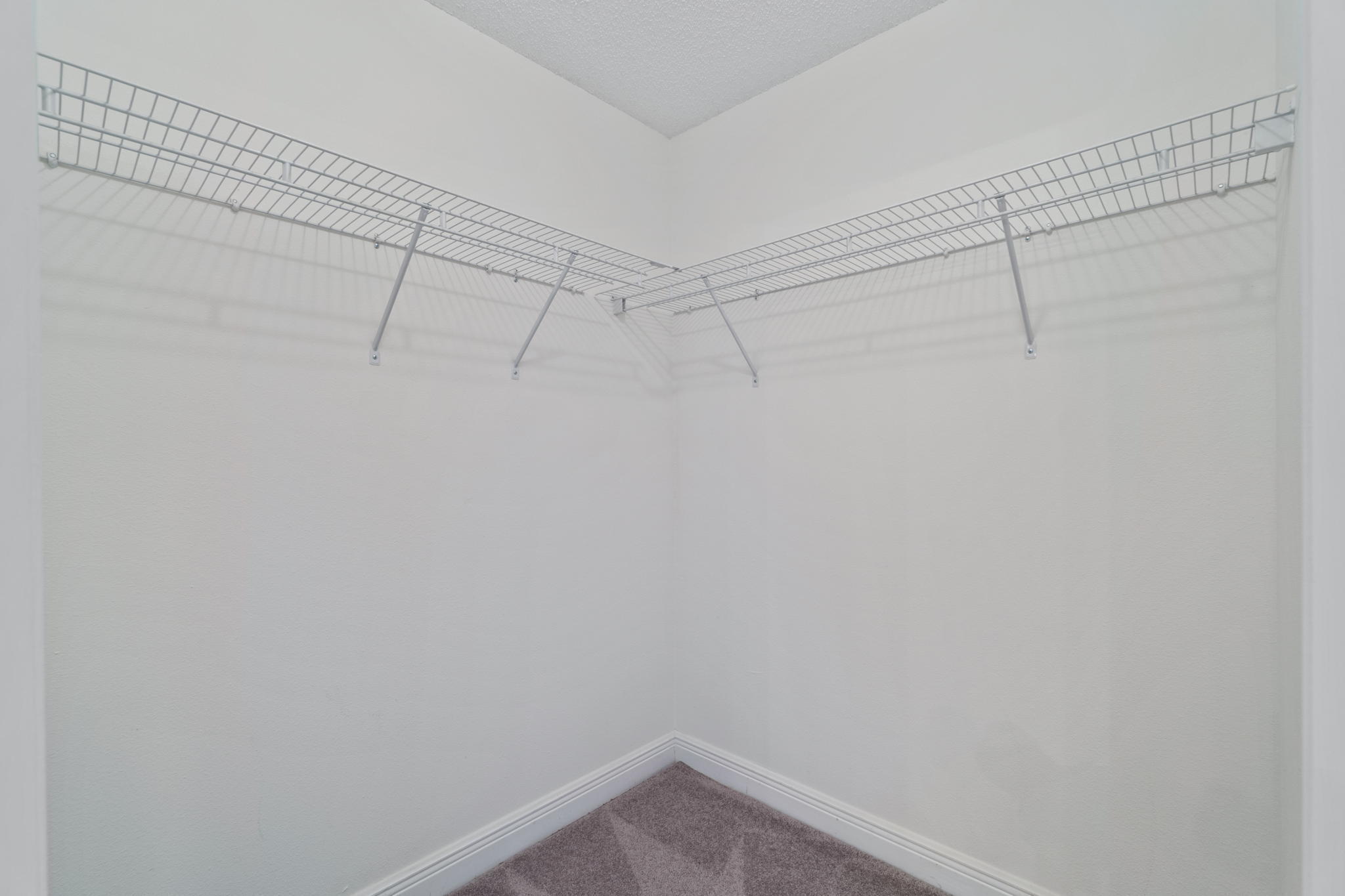 641 Territory Lane Crestview, FL 32536 - Photo 28 of 41 a view of a room with racks on the wall
