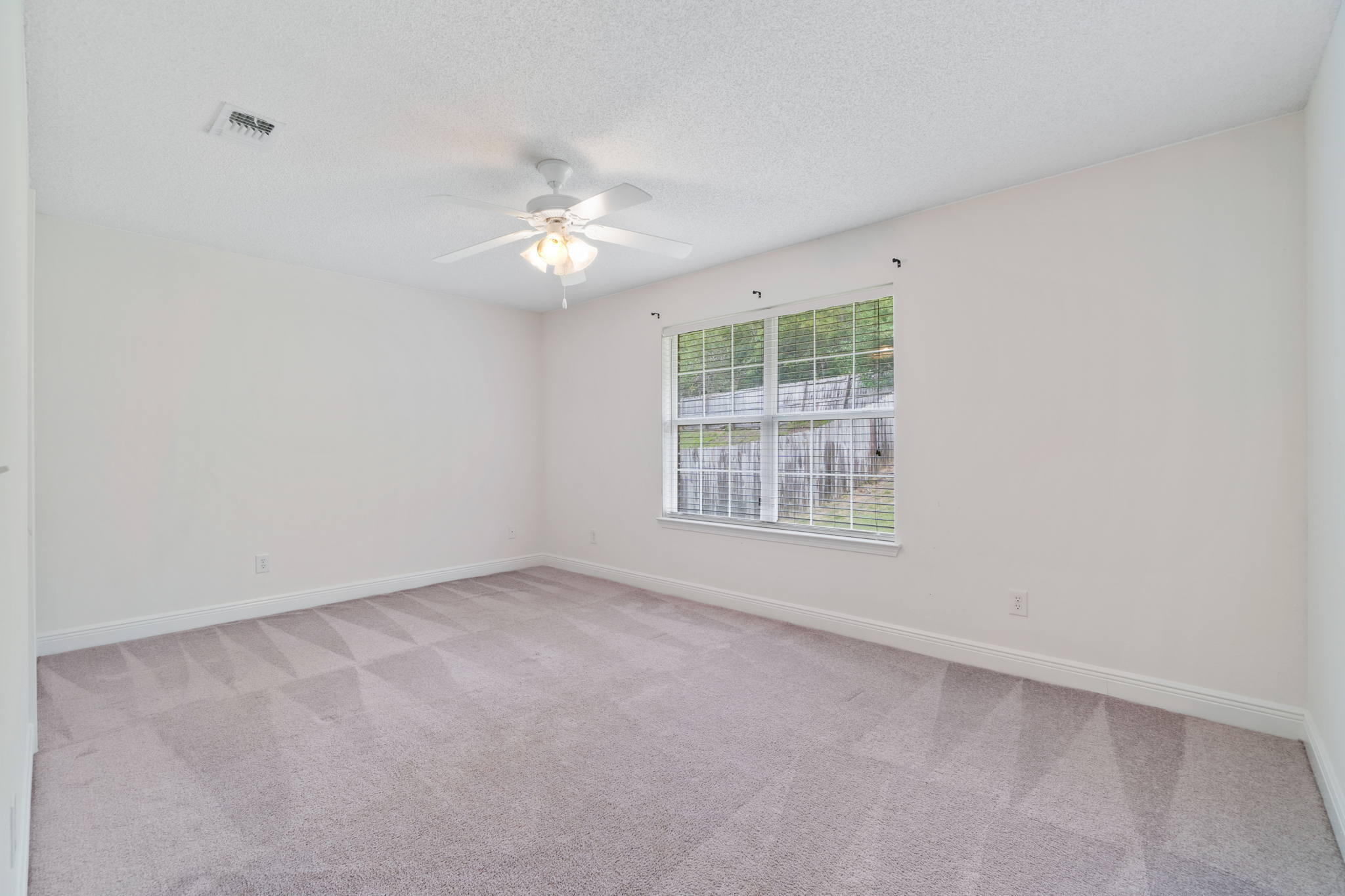 641 Territory Lane Crestview, FL 32536 - Photo 29 of 41 an empty room with a window