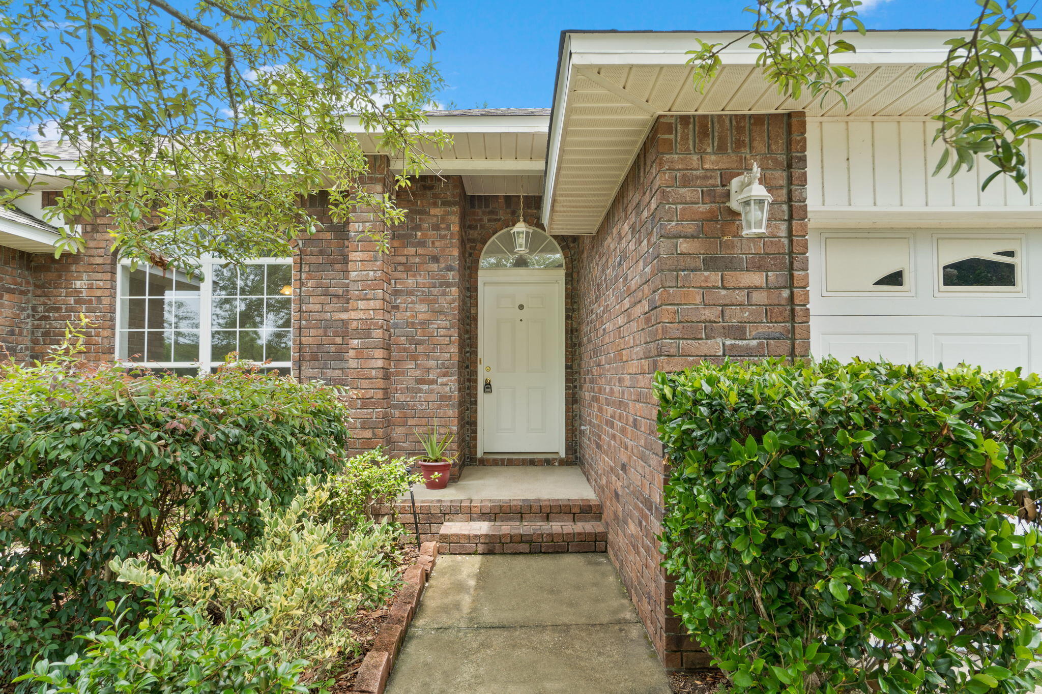 641 Territory Lane Crestview, FL 32536 - Photo 3 of 41 a front view of a house with a yard