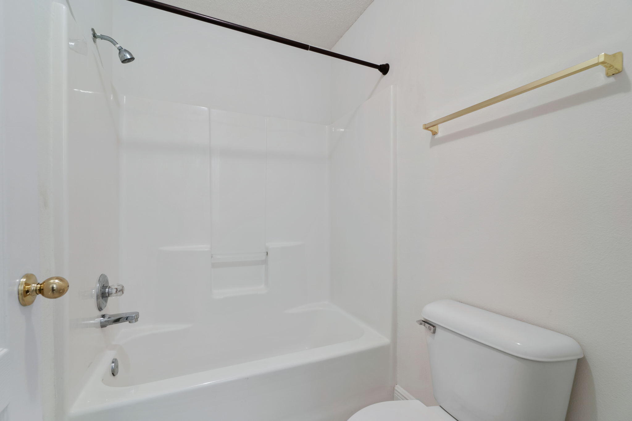 641 Territory Lane Crestview, FL 32536 - Photo 32 of 41 a bath room with a toilet and a bath tub