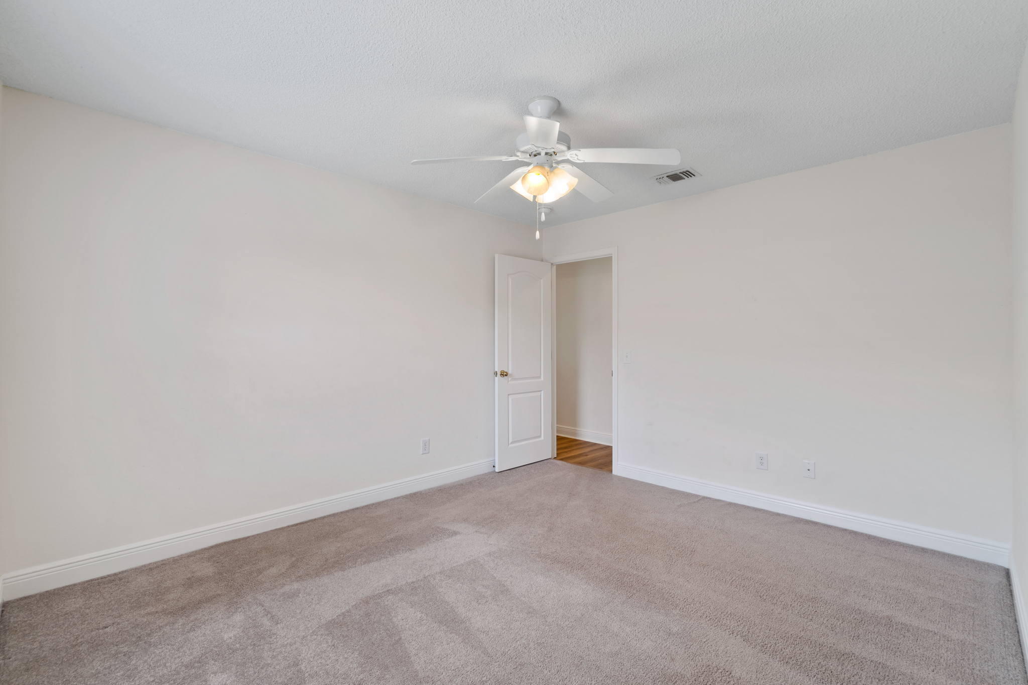 641 Territory Lane Crestview, FL 32536 - Photo 34 of 41 wooden floor in an empty room