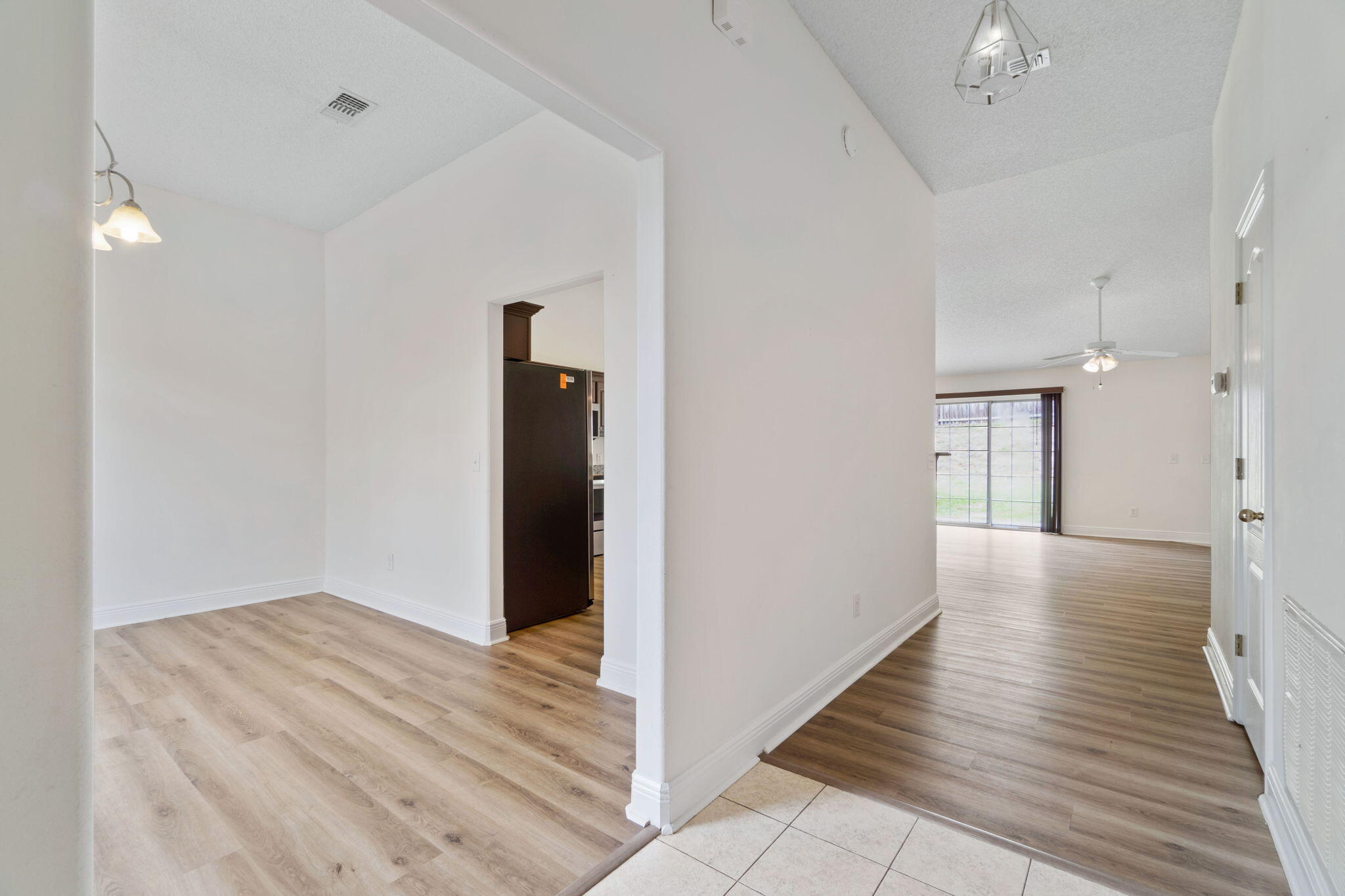 641 Territory Lane Crestview, FL 32536 - Photo 5 of 41 a view of hallway with wooden floor