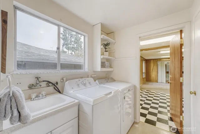a view of bathroom with dual sinks