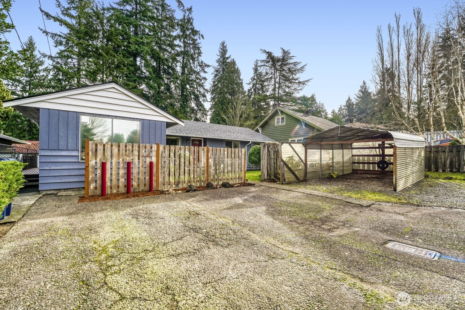 16436 16th Avenue Southwest Burien, WA 98166 - Photo 2 of 30 a view of a house with a yard and wooden fence
