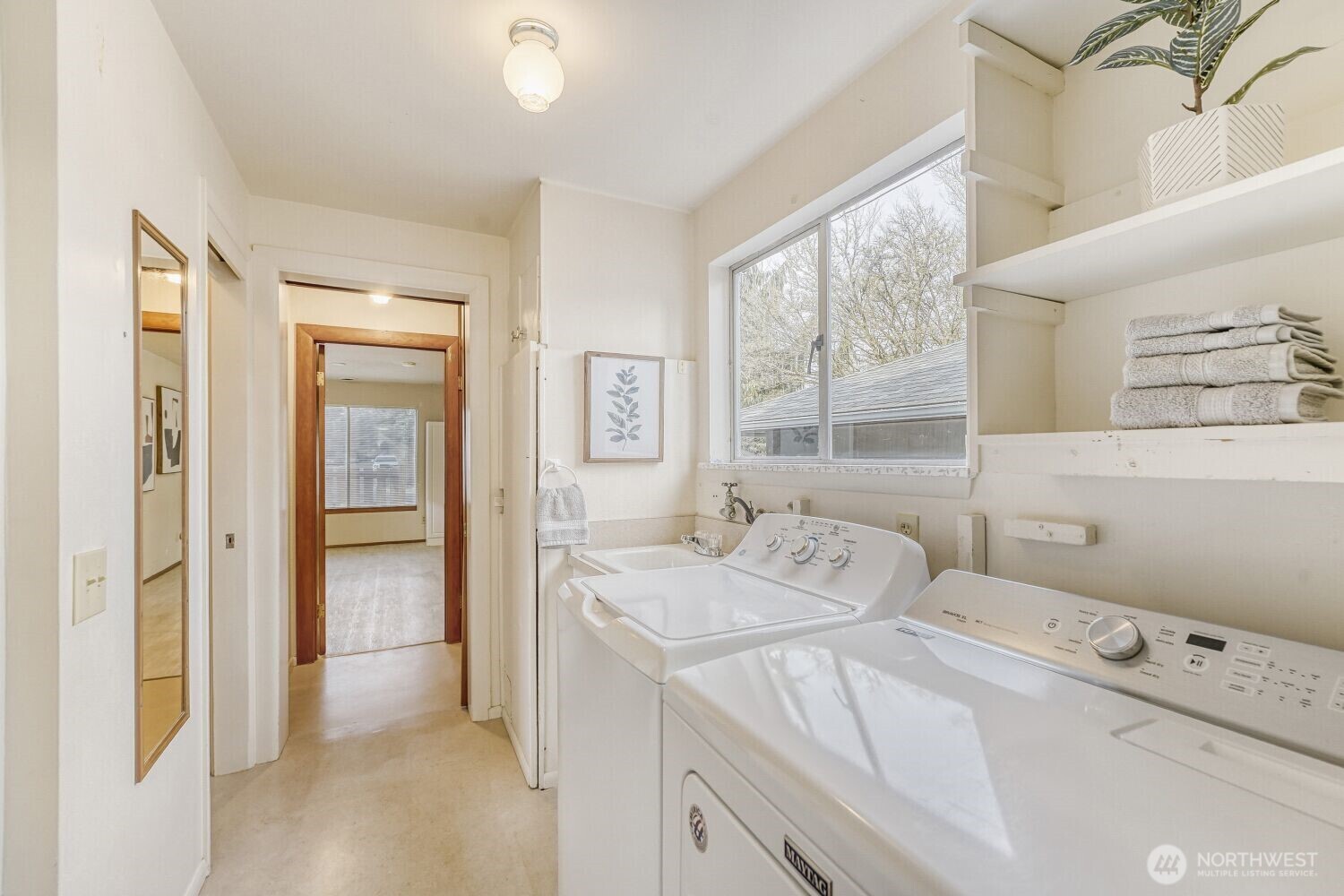 16436 16th Avenue Southwest Burien, WA 98166 - Photo 21 of 30 a bathroom with a sink vanity and tub