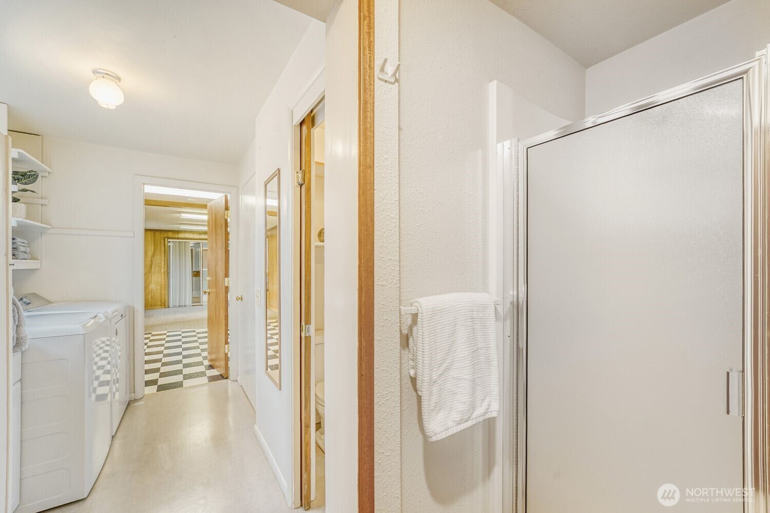 16436 16th Avenue Southwest Burien, WA 98166 - Photo 22 of 30 a view of a bathroom from a hallway