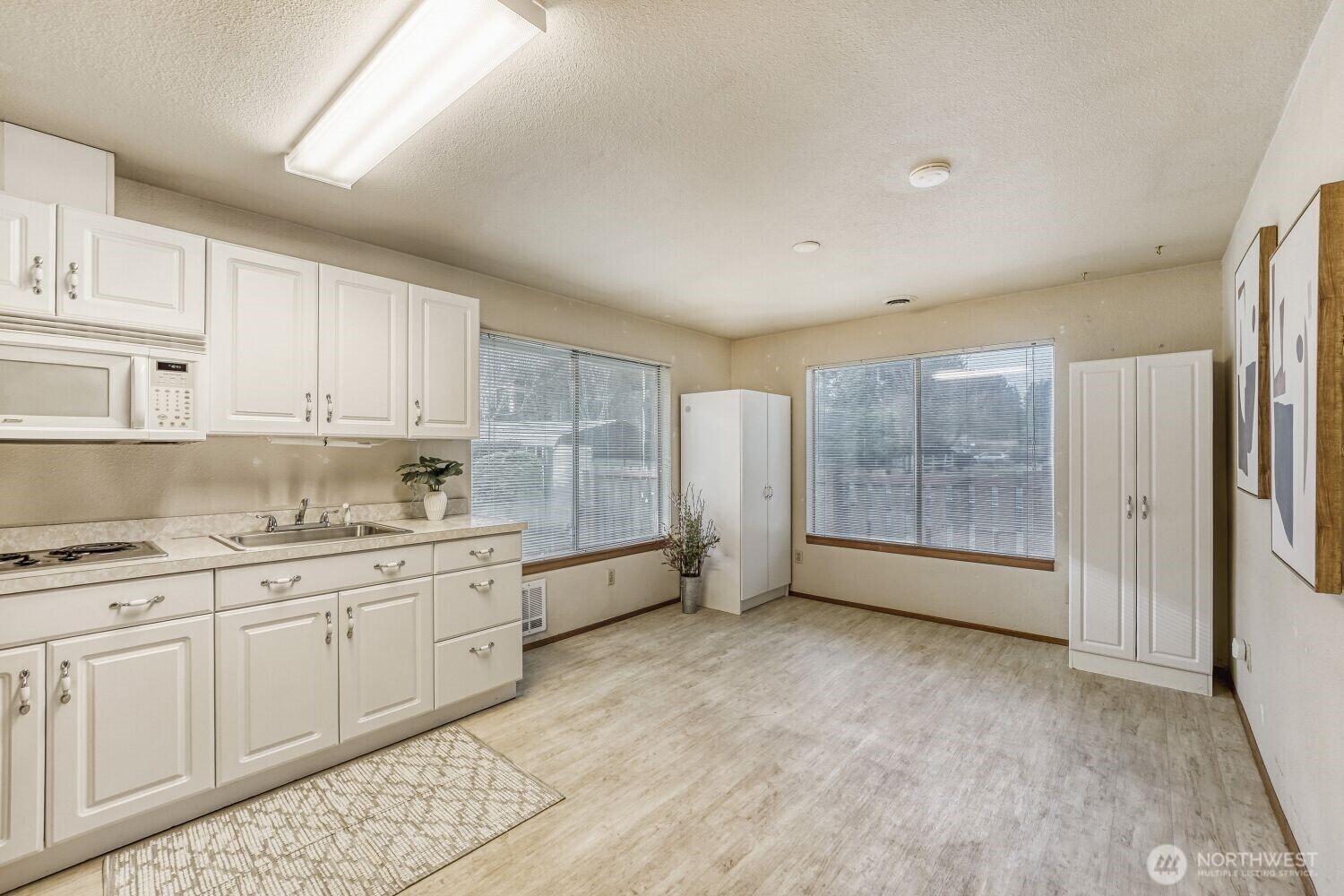 16436 16th Avenue Southwest Burien, WA 98166 - Photo 23 of 30 a view of a kitchen with electric appliances