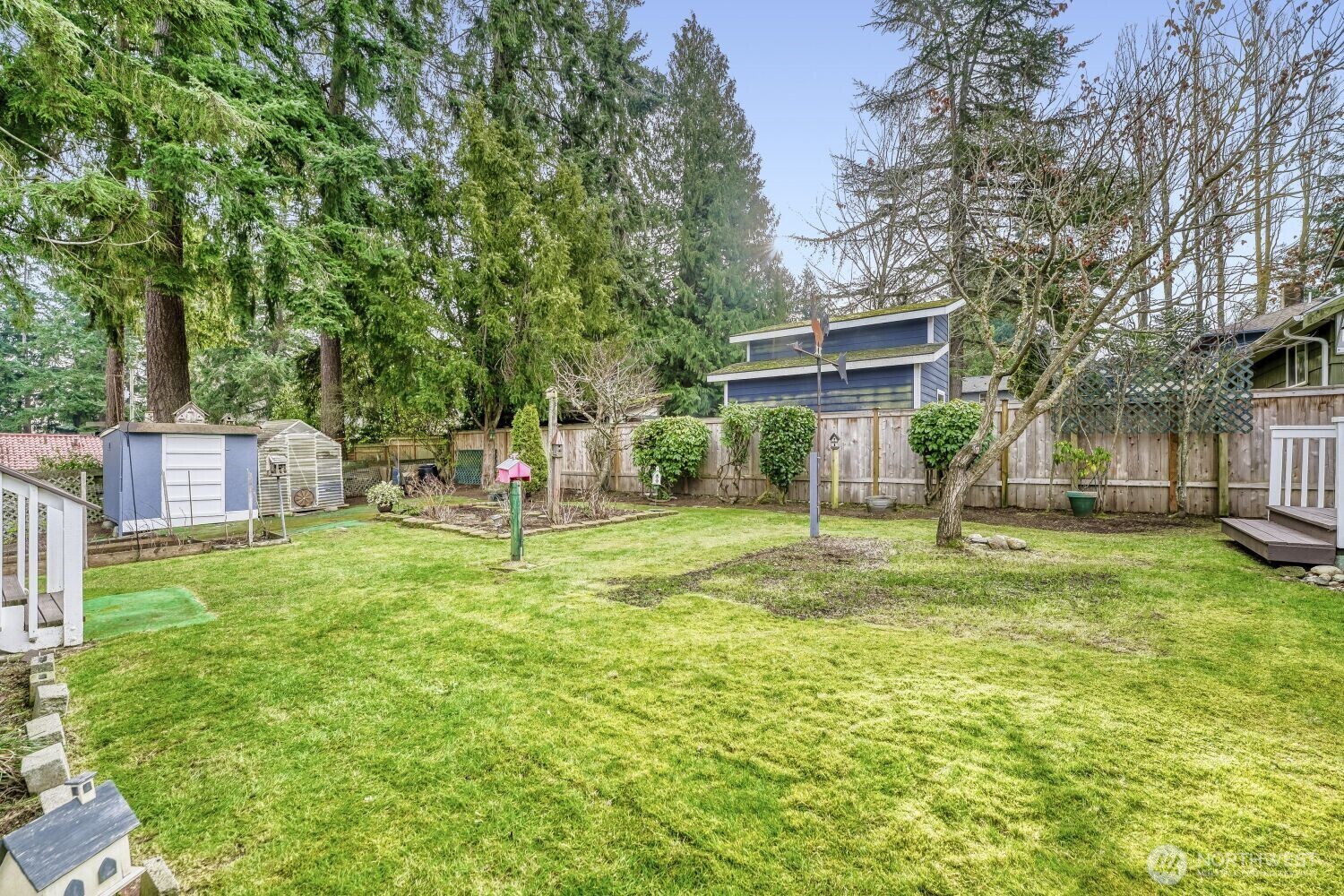 16436 16th Avenue Southwest Burien, WA 98166 - Photo 27 of 30 a view of a house with backyard and a tree