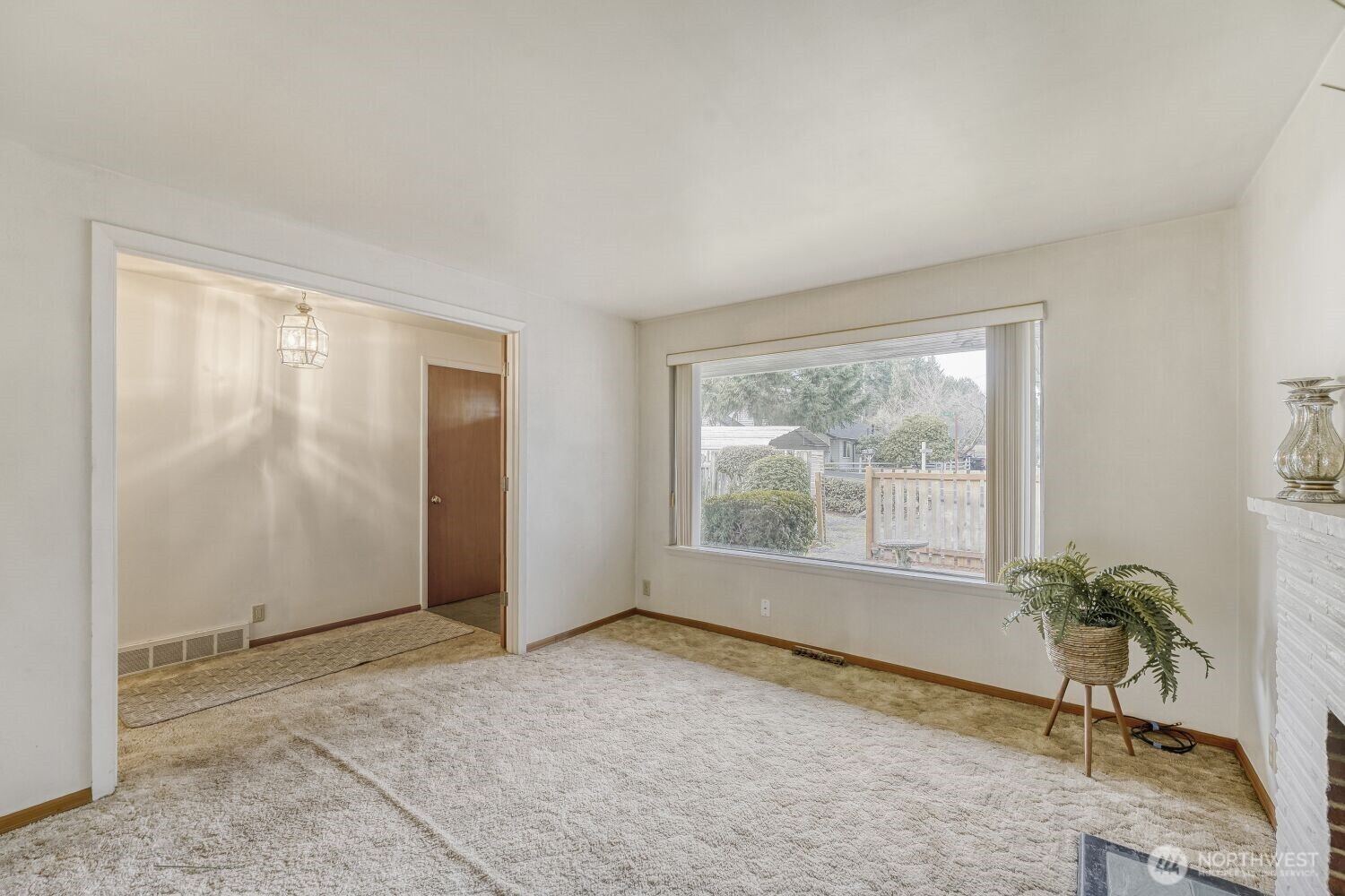 16436 16th Avenue Southwest Burien, WA 98166 - Photo 7 of 30 a view of an empty room with a window