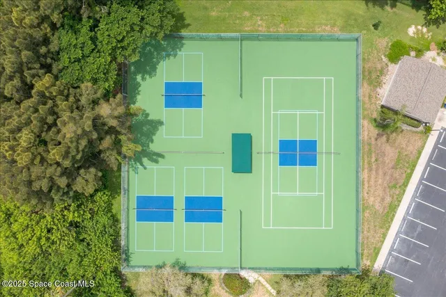 a view of a lake with a yard