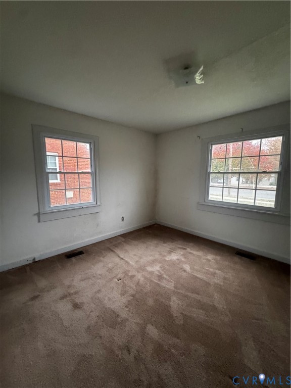 5606 Lakeside Avenue Henrico, VA 23228 - Photo 7 of 10 an empty room with a window
