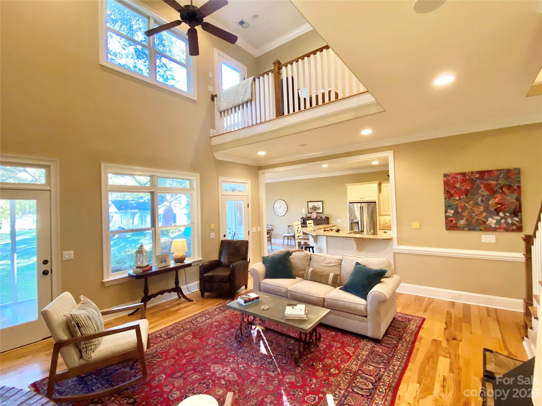 13849 Beatties Ford Road Huntersville, NC 28078 - Photo 14 of 48 a living room with furniture and a large window