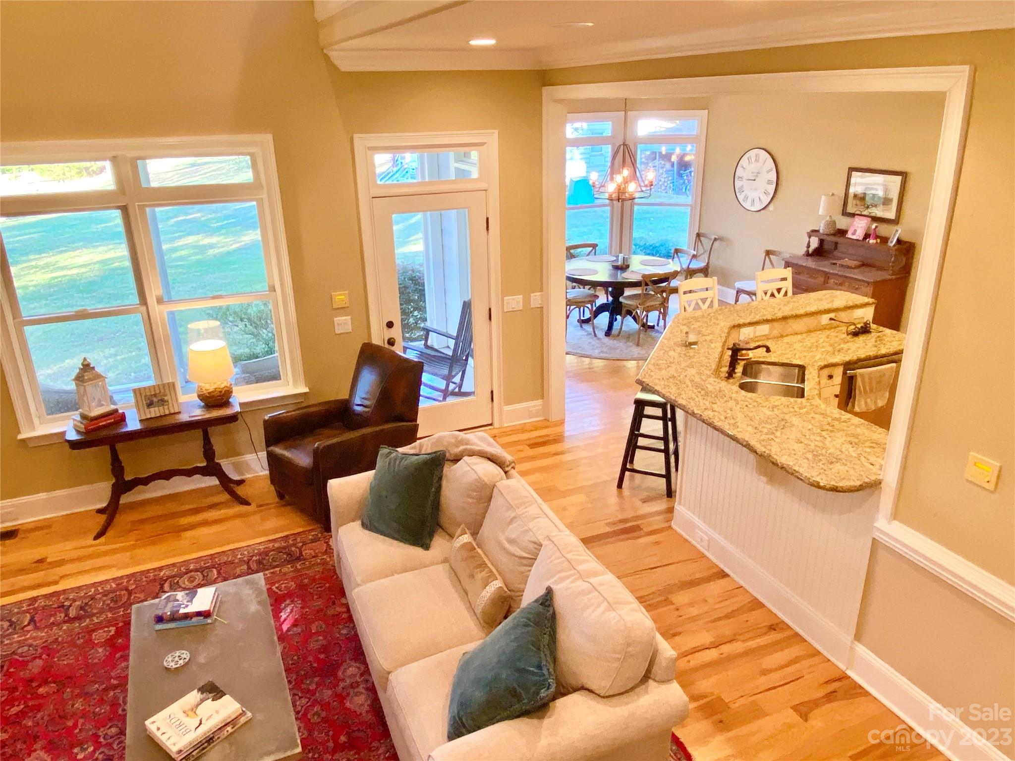 13849 Beatties Ford Road Huntersville, NC 28078 - Photo 17 of 48 a living room with furniture and a large window