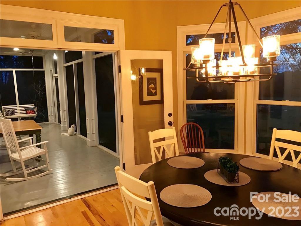 13849 Beatties Ford Road Huntersville, NC 28078 - Photo 22 of 48 a kitchen with a table and chairs