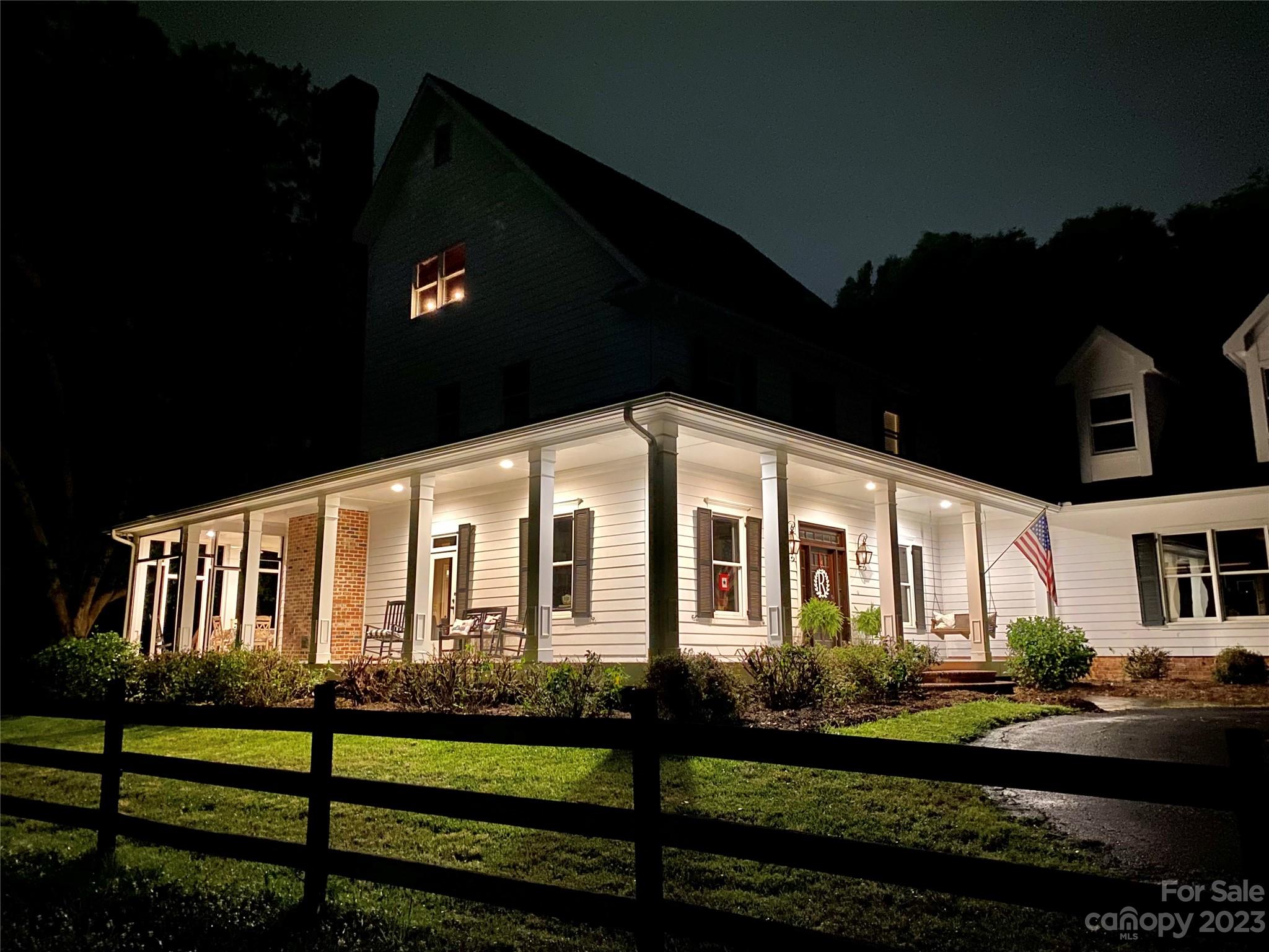 13849 Beatties Ford Road Huntersville, NC 28078 - Photo 3 of 48 a front view of a house with a yard