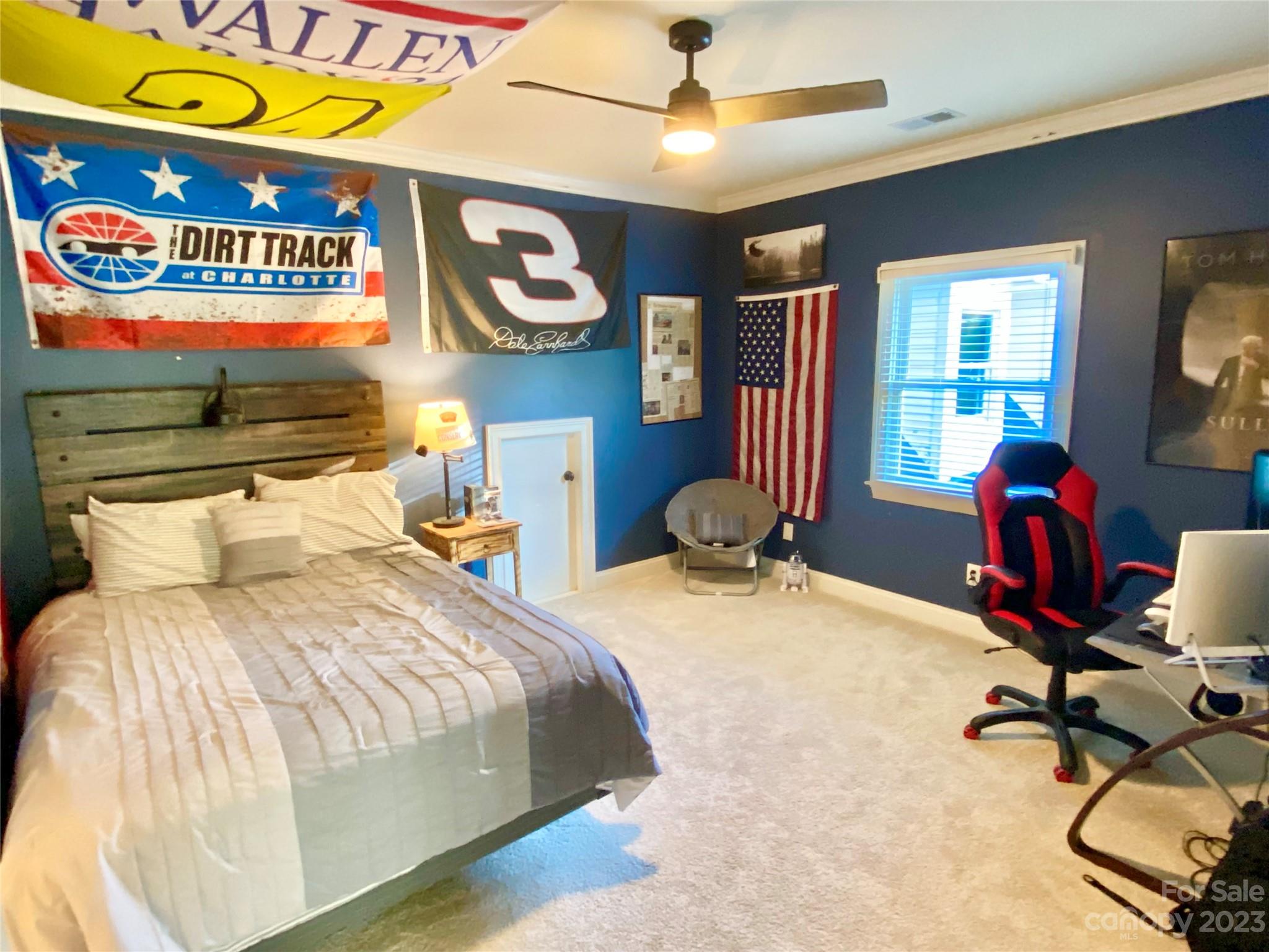 13849 Beatties Ford Road Huntersville, NC 28078 - Photo 31 of 48 a bedroom with a bed and wooden floor