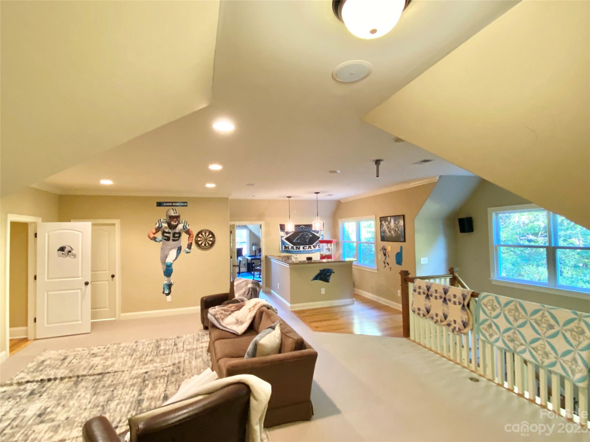 13849 Beatties Ford Road Huntersville, NC 28078 - Photo 34 of 48 a view of a livingroom with furniture and windows