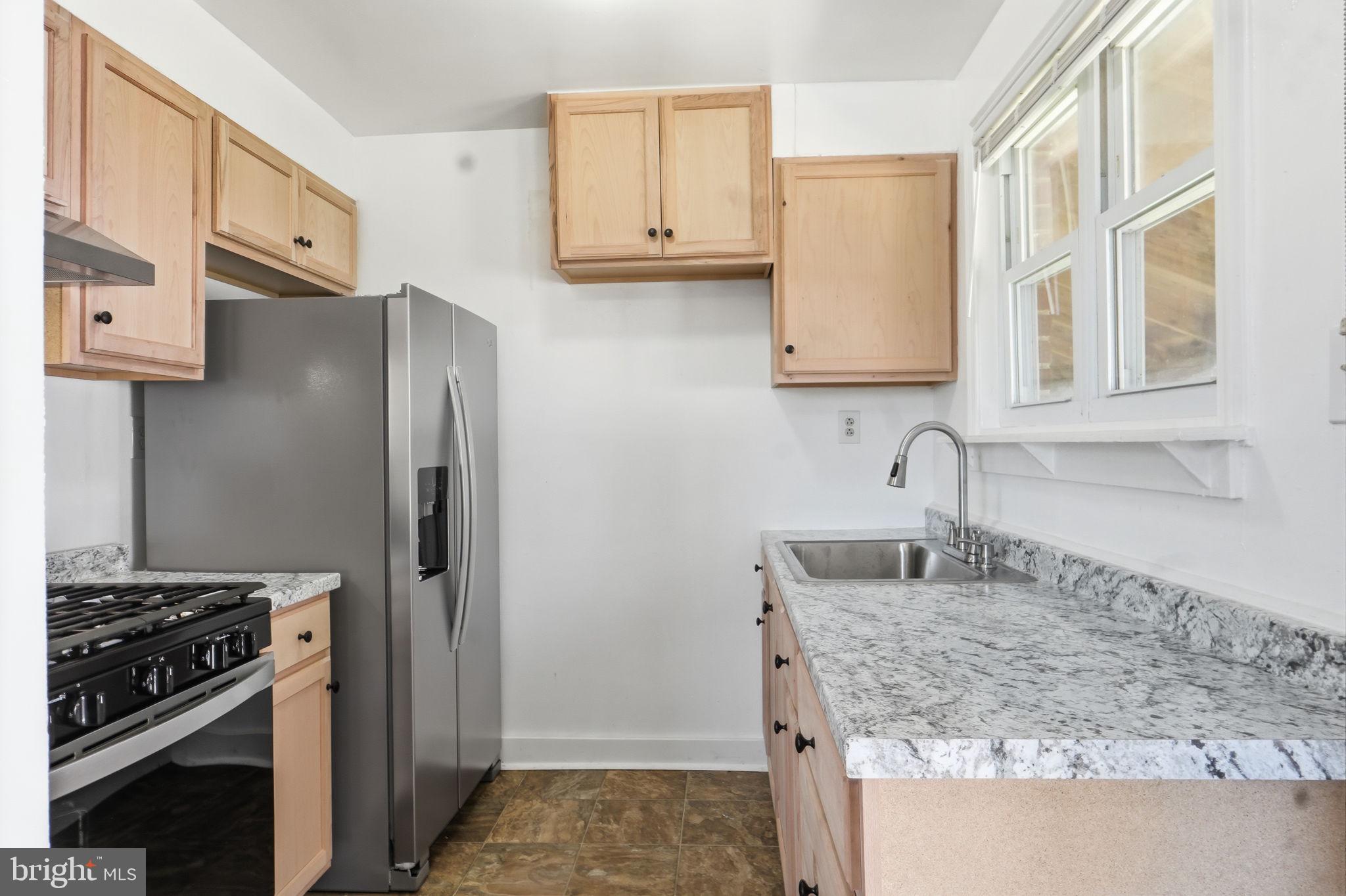 4003 Randolph Road Silver Spring, MD 20902 - Photo 11 of 30 Modern kitchen with sleek finishes.
