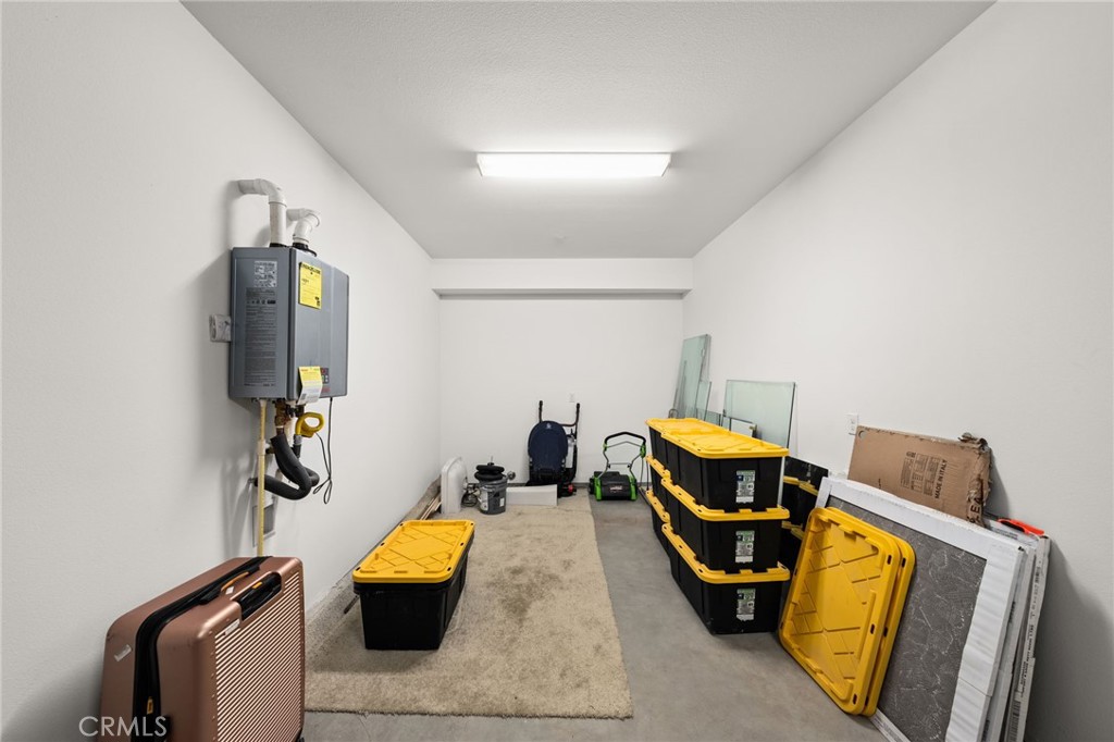 11401 West Serrano Square Yucaipa, CA 92399 - Photo 23 of 46 a bedroom with a bed and a window