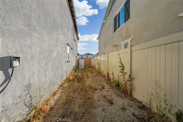 a view of a pathway gate of a building