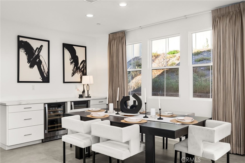 11401 West Serrano Square Yucaipa, CA 92399 - Photo 33 of 46 a view of a dining room with furniture and window