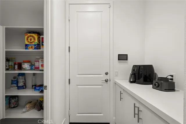 a children room with toys and a window