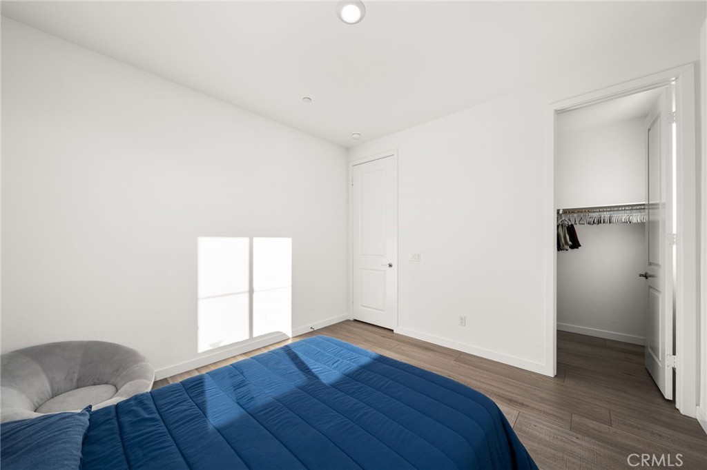 11401 West Serrano Square Yucaipa, CA 92399 - Photo 38 of 46 a view of empty room with wooden floor