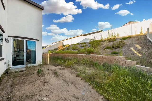 a house view with a garden space