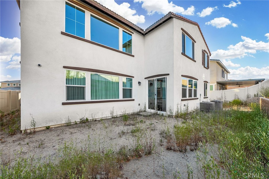11401 West Serrano Square Yucaipa, CA 92399 - Photo 40 of 46 a house view with a garden space