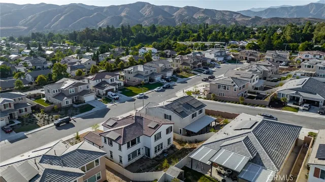 an aerial view of a town with couple of houses