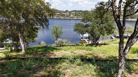 a view of an lake and a yard