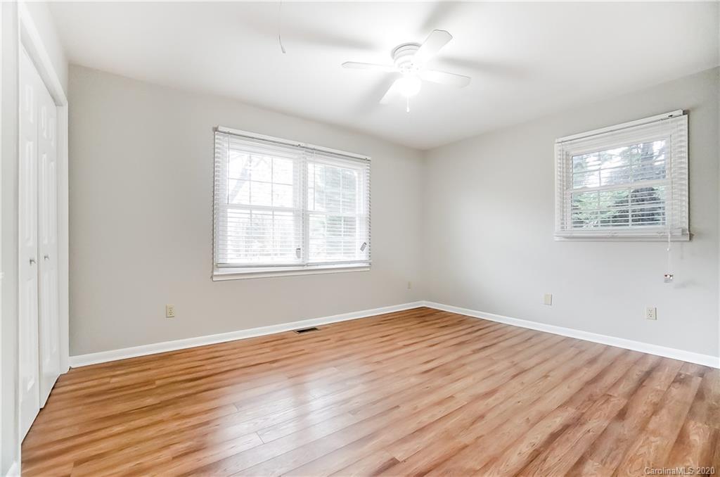 2385 Whitley Road Fort Mill, SC 29708 - Photo 14 of 25 a view of an empty room with wooden floor and a window