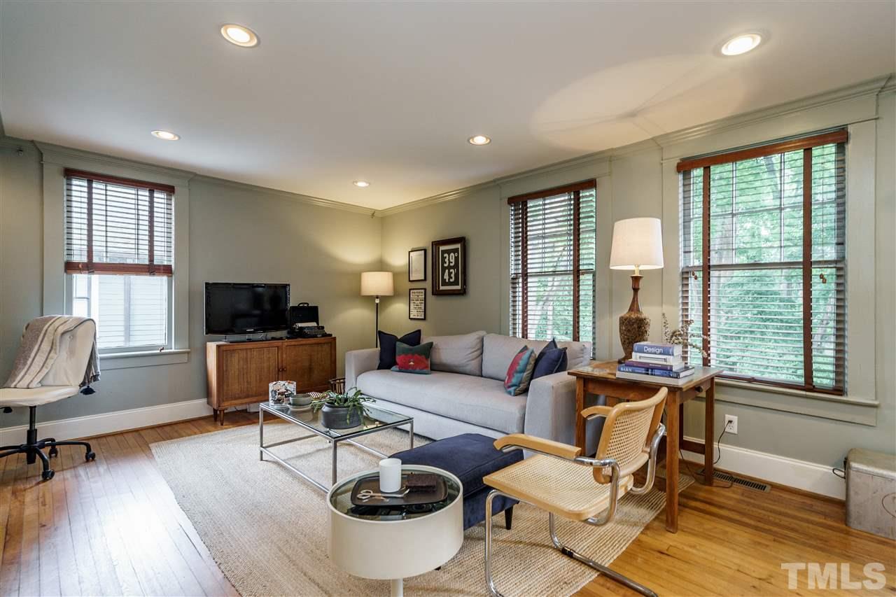 121 Hudson Street Raleigh, NC 27608 - Photo 16 of 30 a living room with furniture and a window