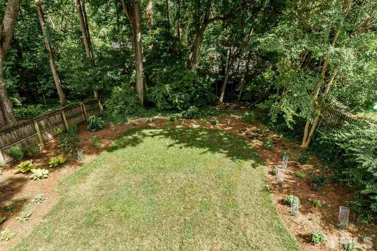 121 Hudson Street Raleigh, NC 27608 - Photo 29 of 30 a view of backyard with green space
