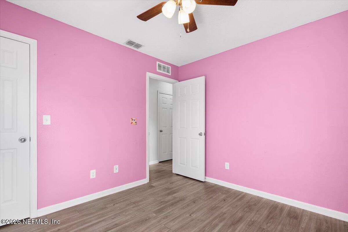 3094 Jennings Road Jacksonville, FL 32218 - Photo 15 of 33 a view of a livingroom with a ceiling fan and window
