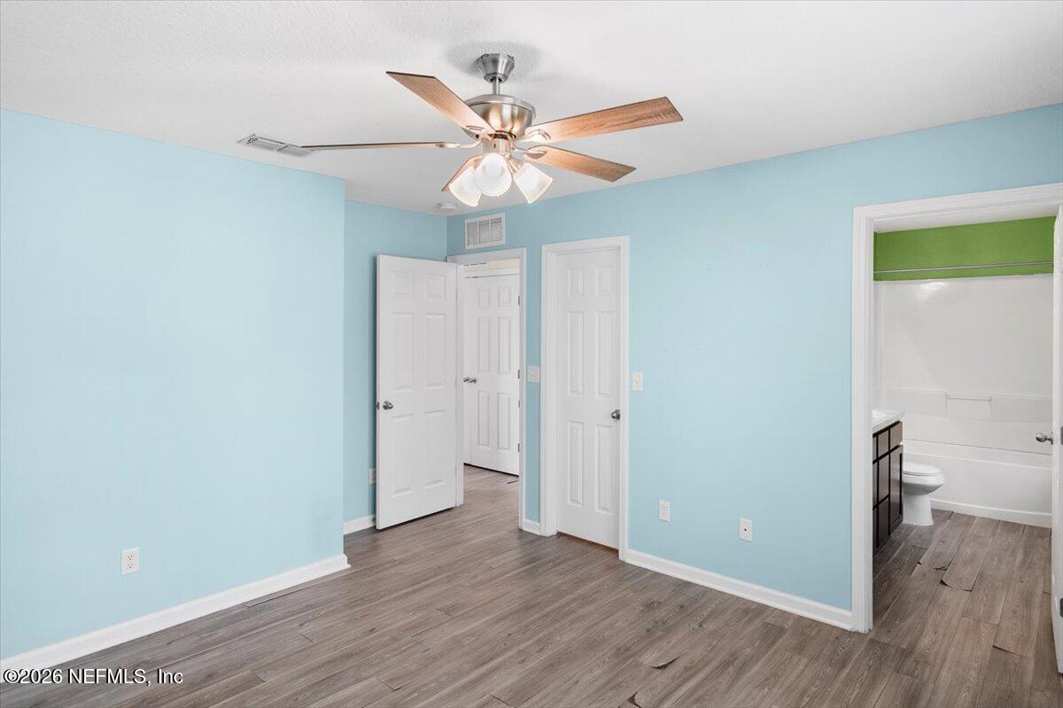 3094 Jennings Road Jacksonville, FL 32218 - Photo 20 of 33 a view of an empty room and wooden floor
