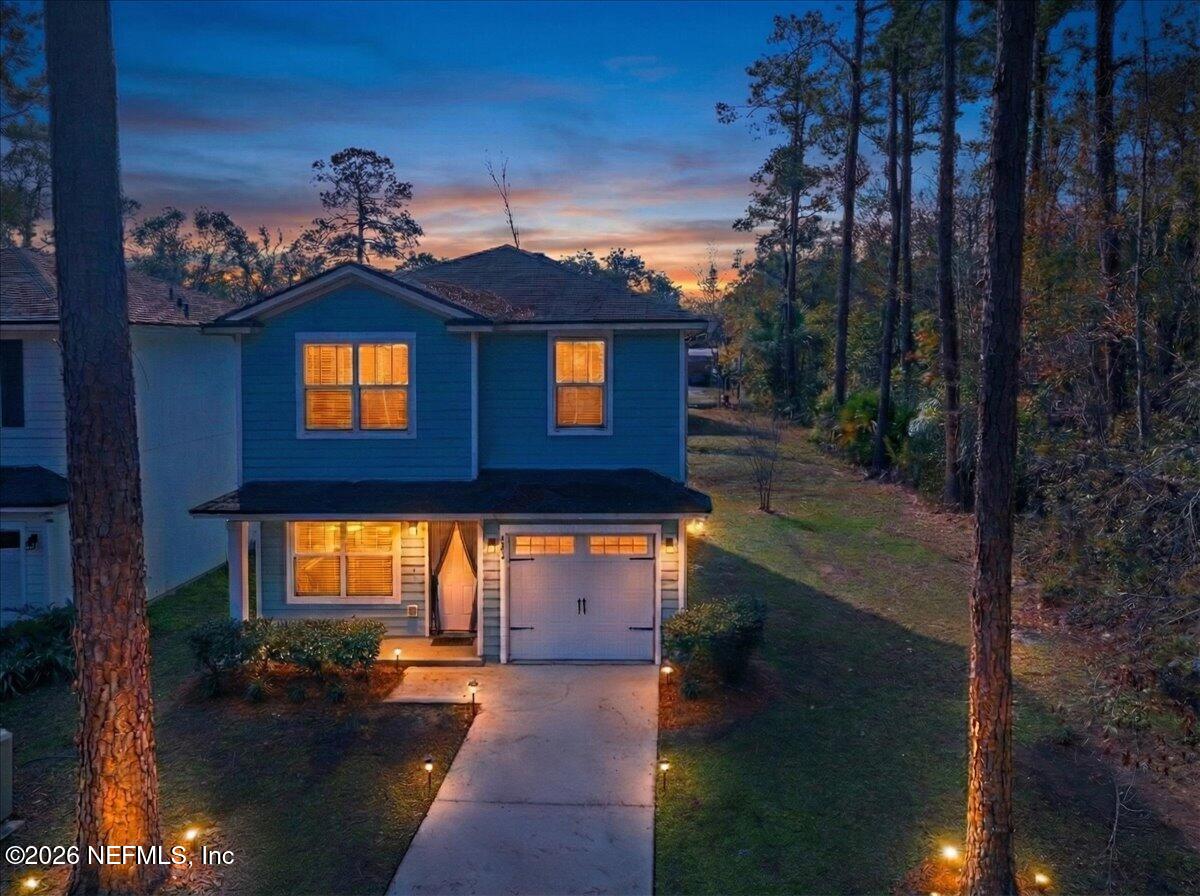 3094 Jennings Road Jacksonville, FL 32218 - Photo 2 of 33 a front view of a house with a yard