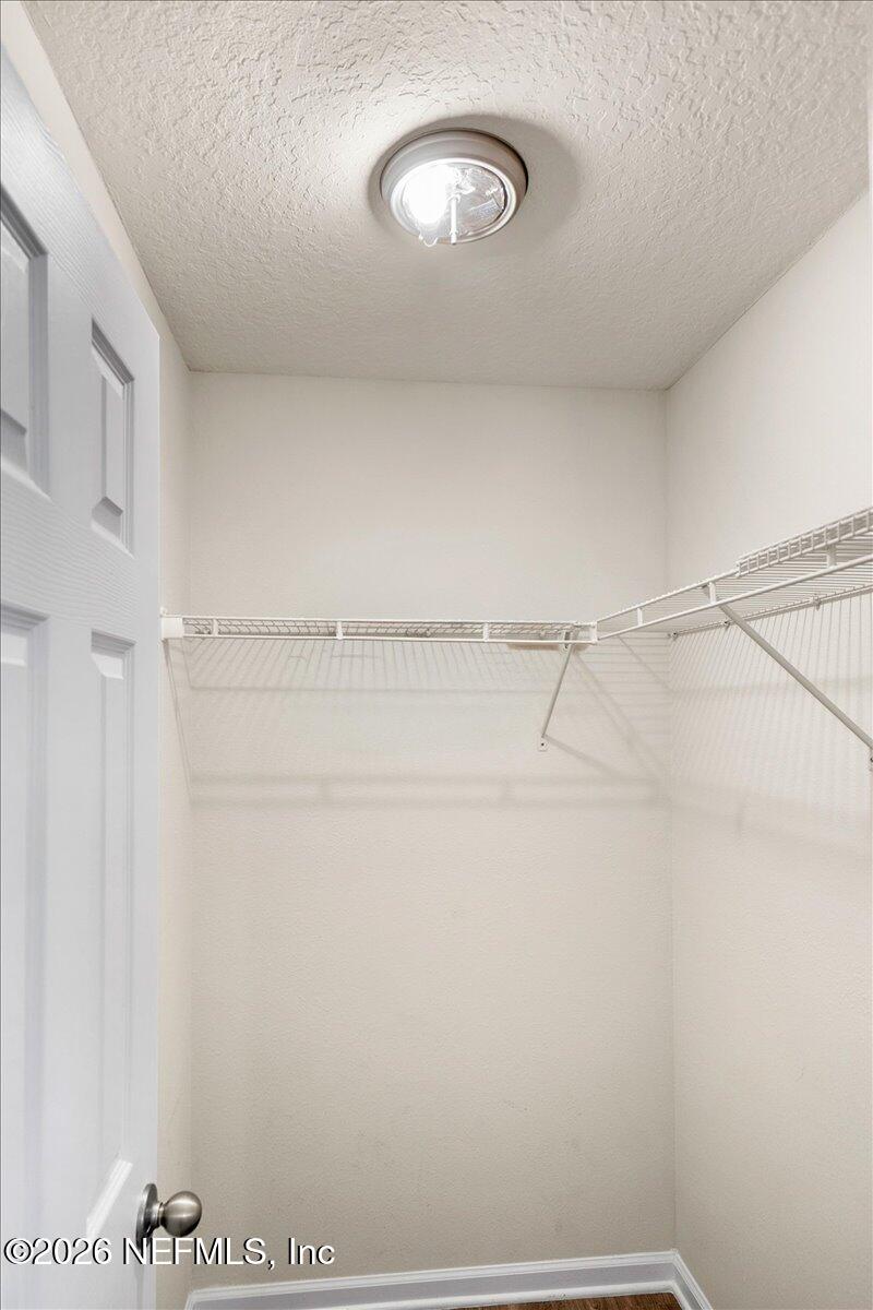 3094 Jennings Road Jacksonville, FL 32218 - Photo 21 of 33 a view of a room with racks on the wall