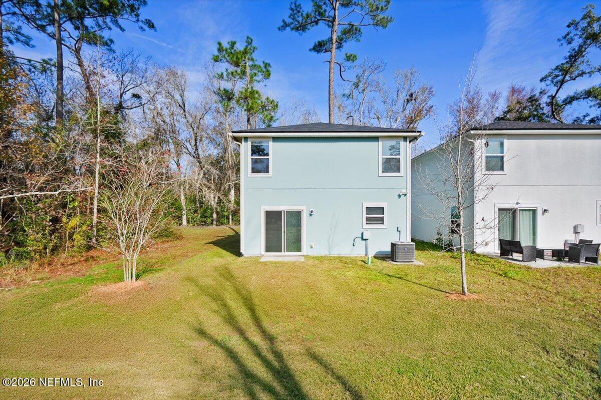 3094 Jennings Road Jacksonville, FL 32218 - Photo 25 of 33 a view of a house with a large trees