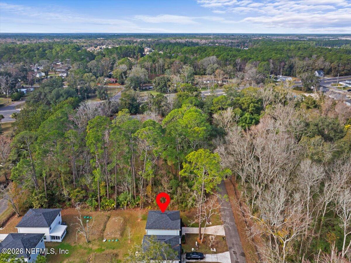 3094 Jennings Road Jacksonville, FL 32218 - Photo 31 of 33 an aerial view of residential houses with outdoor space and trees