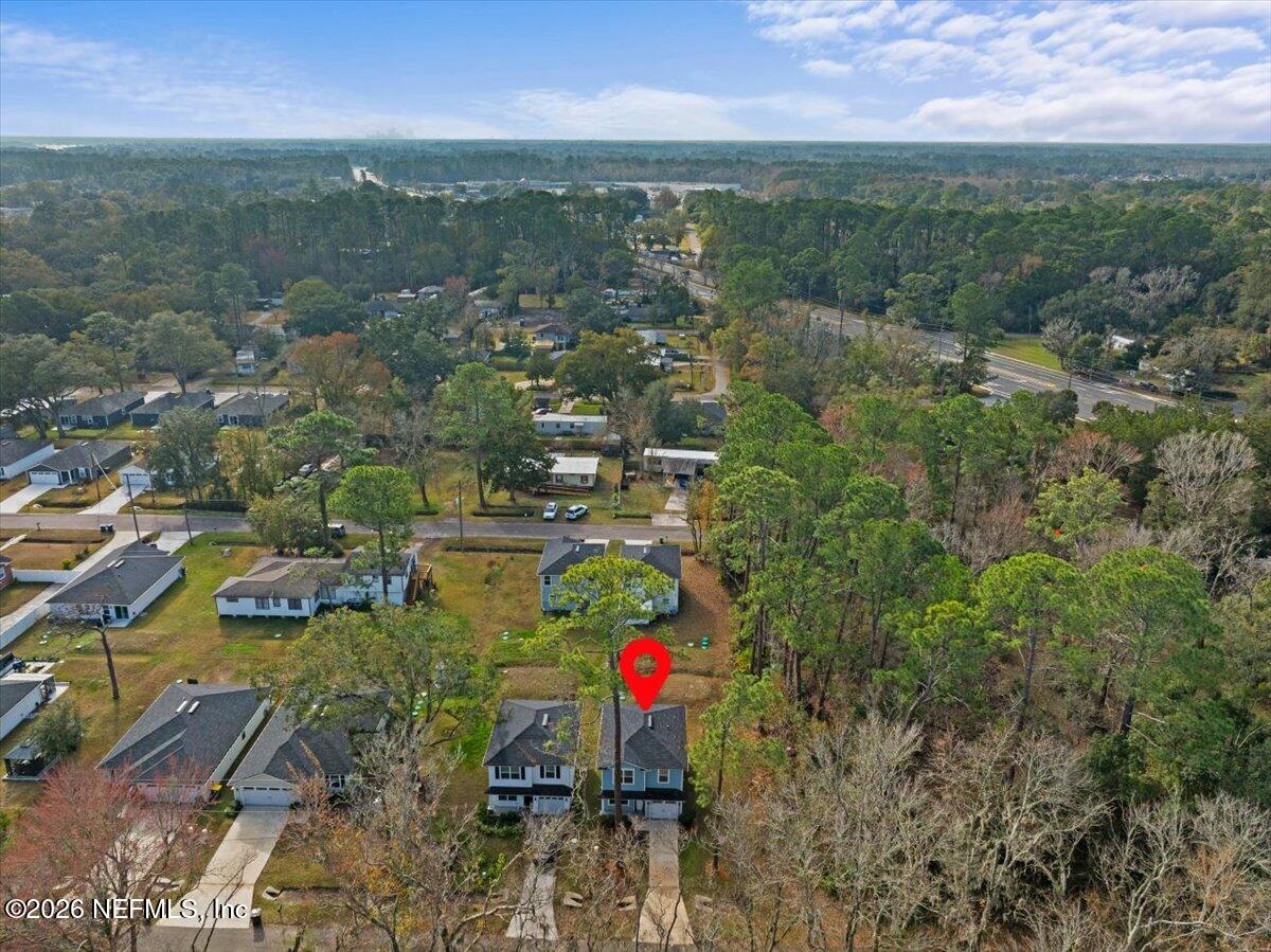 3094 Jennings Road Jacksonville, FL 32218 - Photo 33 of 33 an aerial view of residential houses with outdoor space and trees