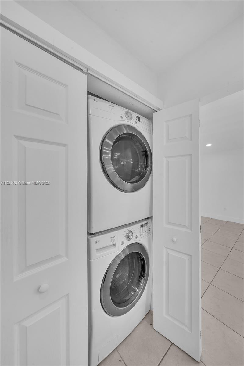 6211 Southwest 116th Place, Unit C22 Miami, FL 33173 - Photo 12 of 32 a utility room with sink dryer and washer