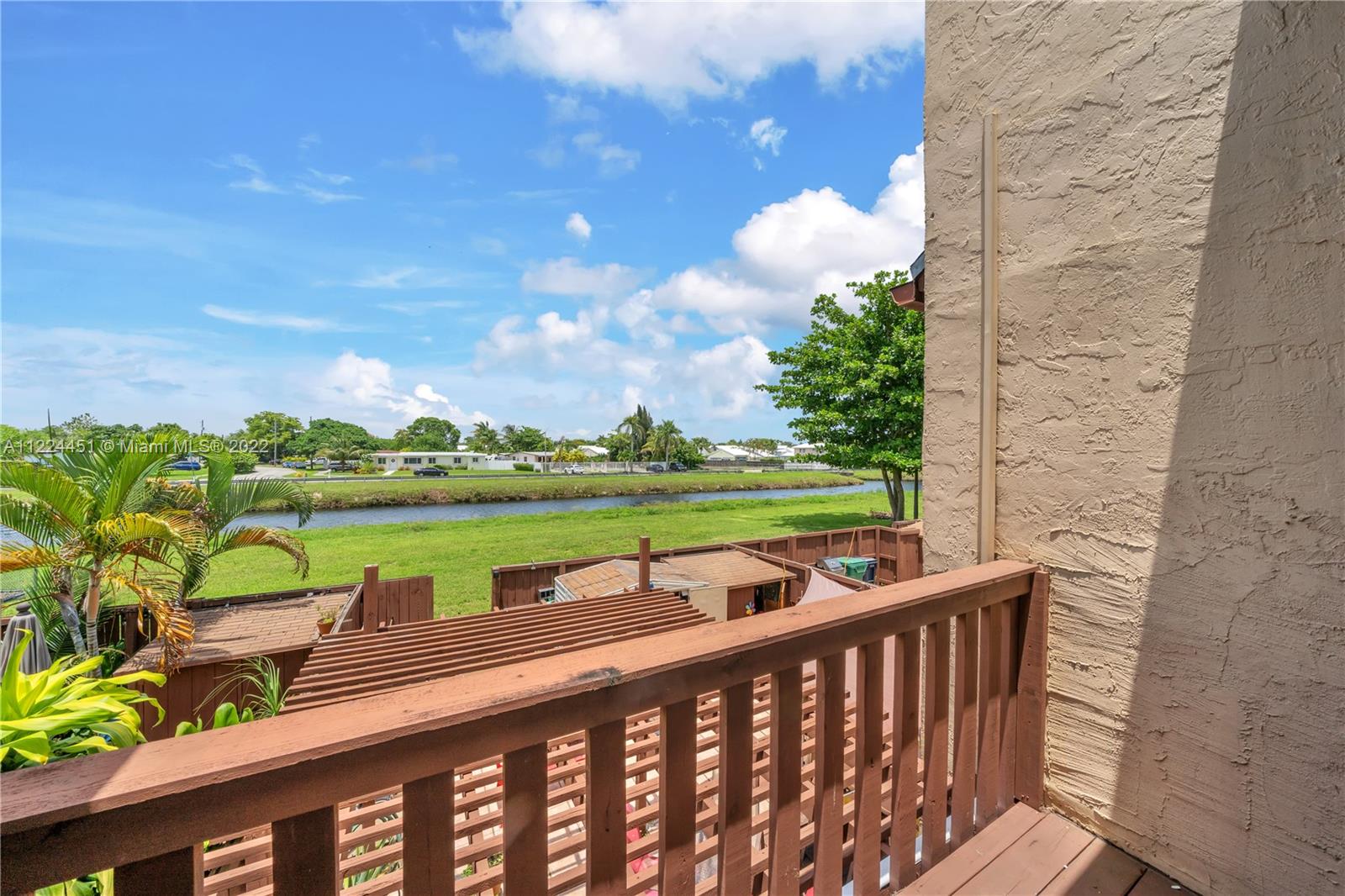 6211 Southwest 116th Place, Unit C22 Miami, FL 33173 - Photo 21 of 32 a view of a two chairs on the roof deck