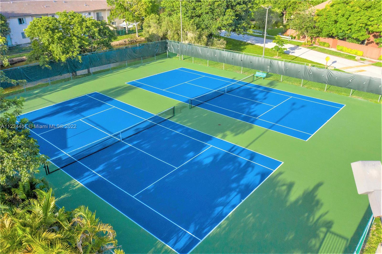 6211 Southwest 116th Place, Unit C22 Miami, FL 33173 - Photo 29 of 32 a view of an outdoor space and a swimming pool