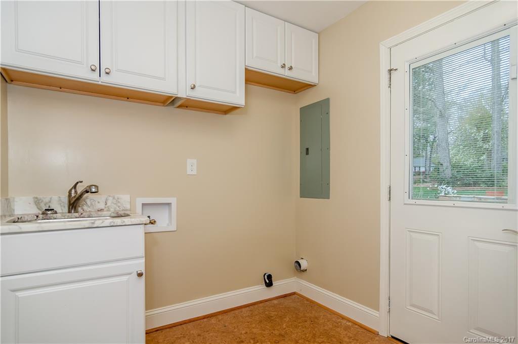3936 Tilley Morris Road Matthews, NC 28105 - Photo 12 of 24 a bathroom with a sink and a window