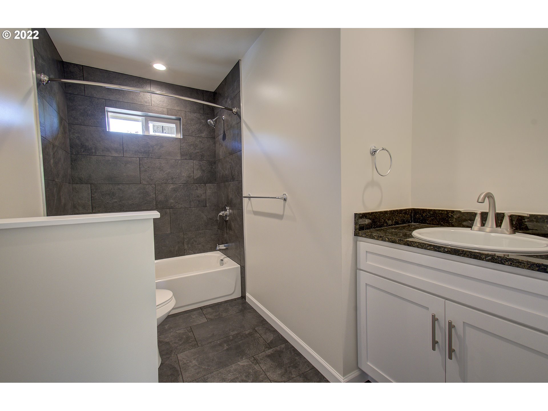 70446 Forest Park Road Rainier, OR 97048 - Photo 21 of 32 a bathroom with a sink a toilet and shower