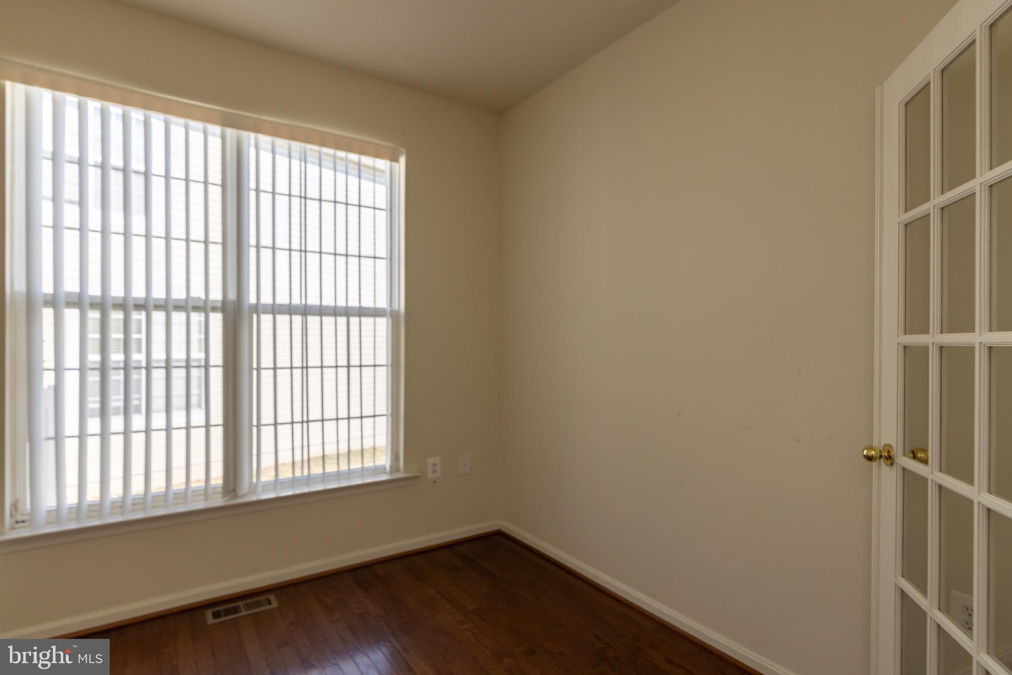 9814 Traver Street Bowie, MD 20721 - Photo 22 of 75 a view of an empty room with a window