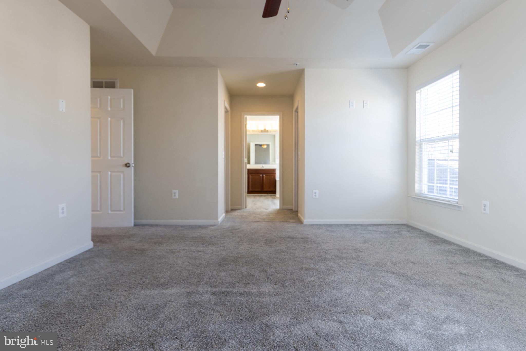 9814 Traver Street Bowie, MD 20721 - Photo 26 of 75 an empty room with windows and closet